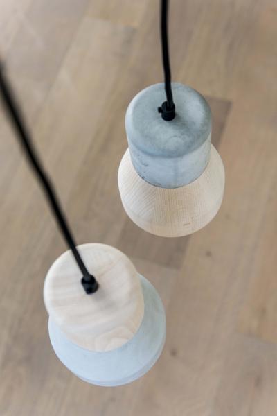 Specimen Editions by Thinkk Studio wood and concrete pendants