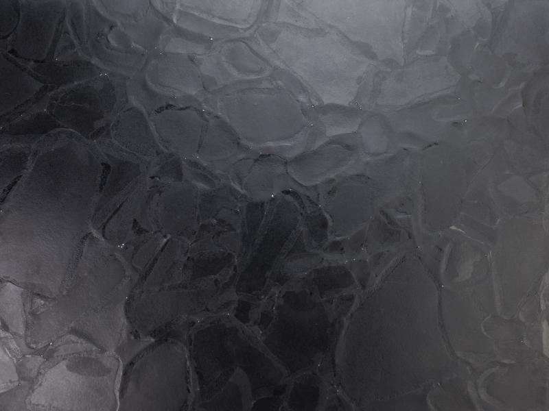 CoveringsETC Noir Bio-Glass countertop surface